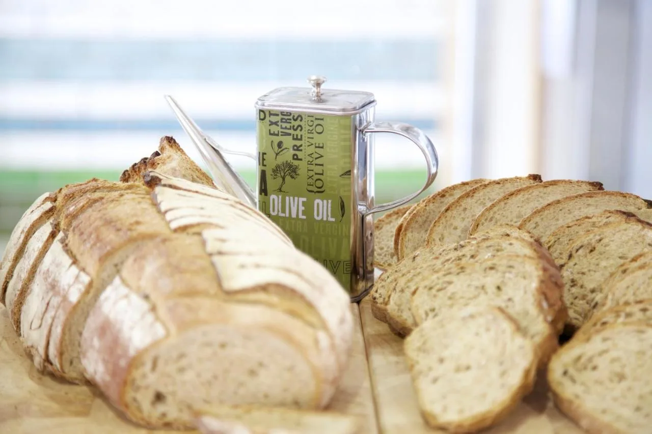 a group of loaves of bread and a can of coffee at The Z Hotel Piccadilly in London